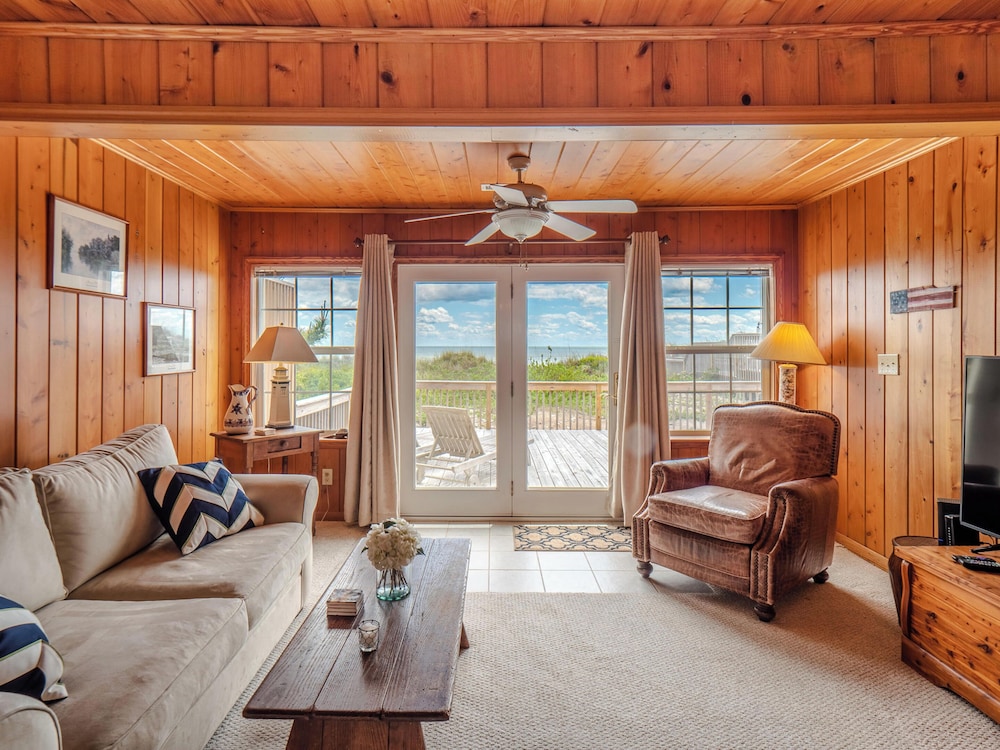 A Charm of Finches by Topsail Realty