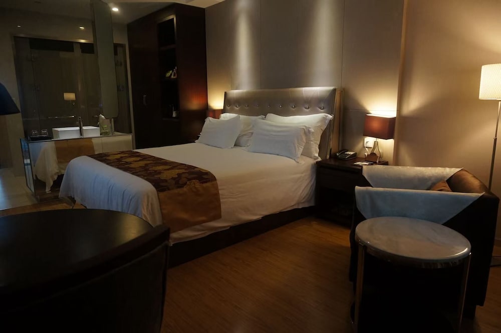 Baolong Homelike Hotel Changxing Branch