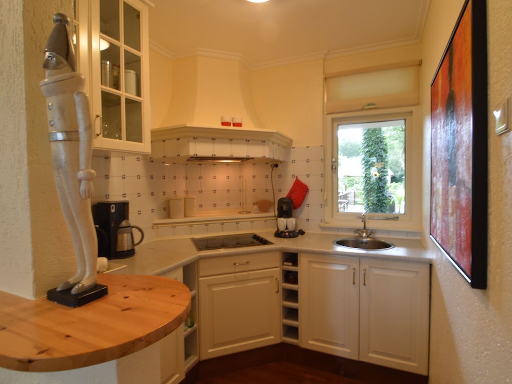 A Detached Bungalow With Outdoor Fireplace, Covered Terrace and Pond in a Forest Plot view 4