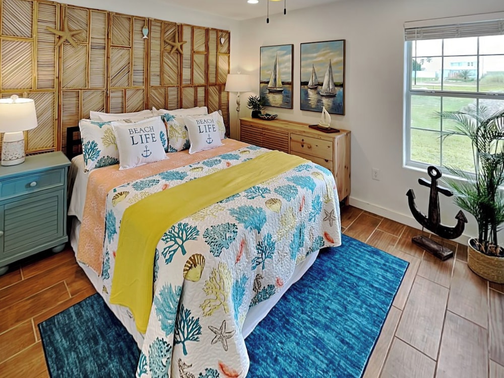 Inn at Dolphin Bay by Miss Kitty’s