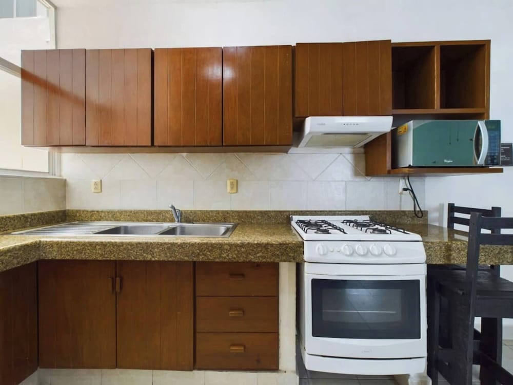 Stylish 2BR Retreat With Private Patio