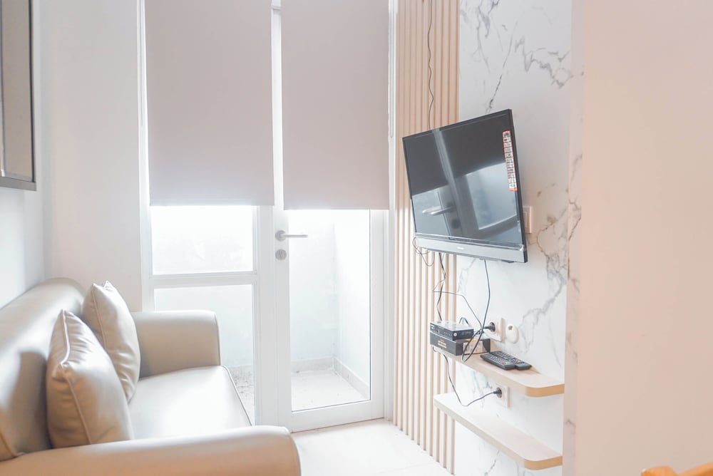 High Floor 1BR at Vasanta Innopark Apartment near MM2100 and Cibitung