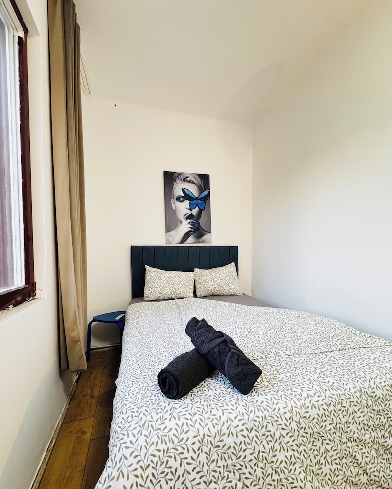 Central 8BR Stay with Garden and Terrace