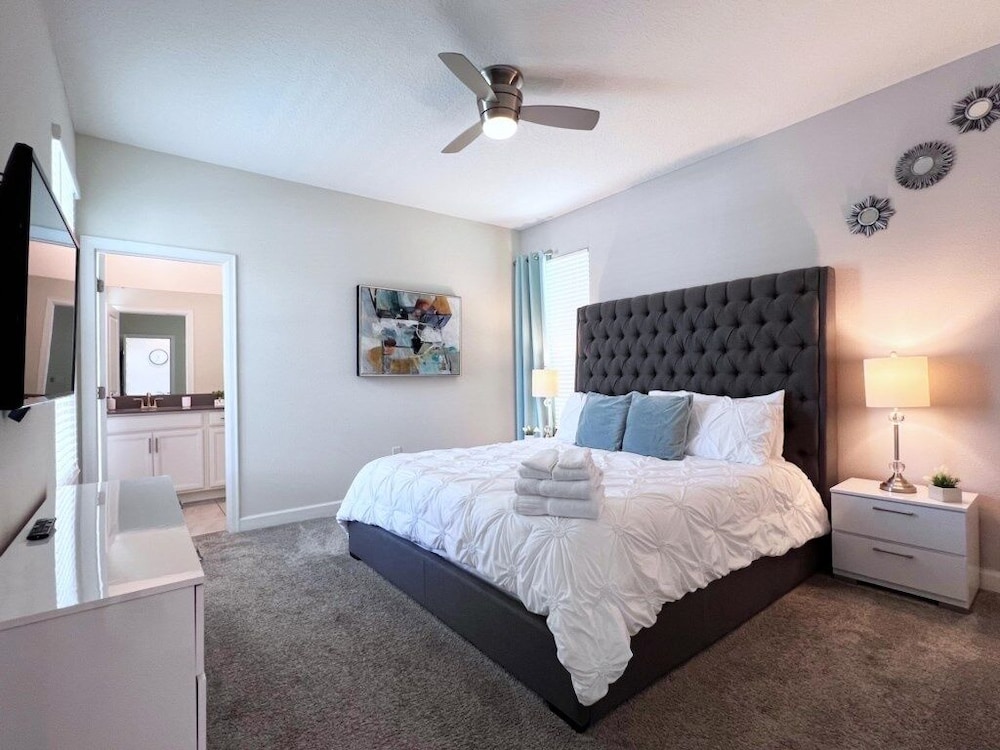 5 Bed 5 Bath South Facing Pool Home Storey Lake 5 Bedroom Home by RedAwning view 4