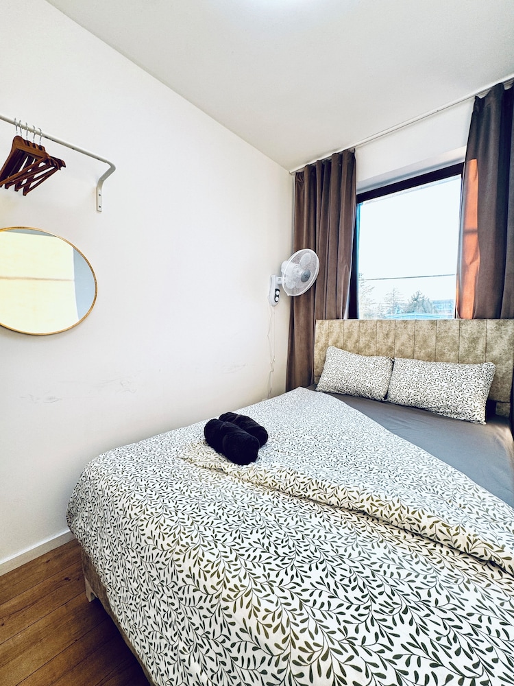 Central 8BR Stay with Garden and Terrace