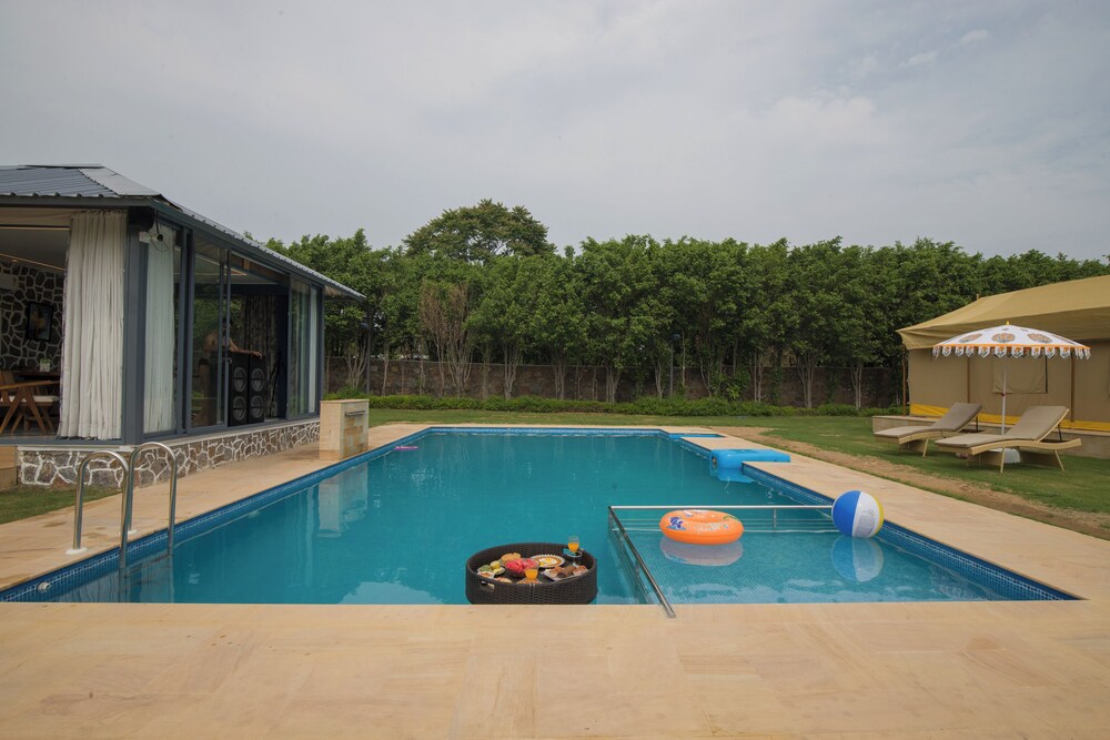 ELIVAAS 5-BHK with Luxe Mudhouses, Tents, Pond & Pvt Pool | Kaimalgarh Farmstay