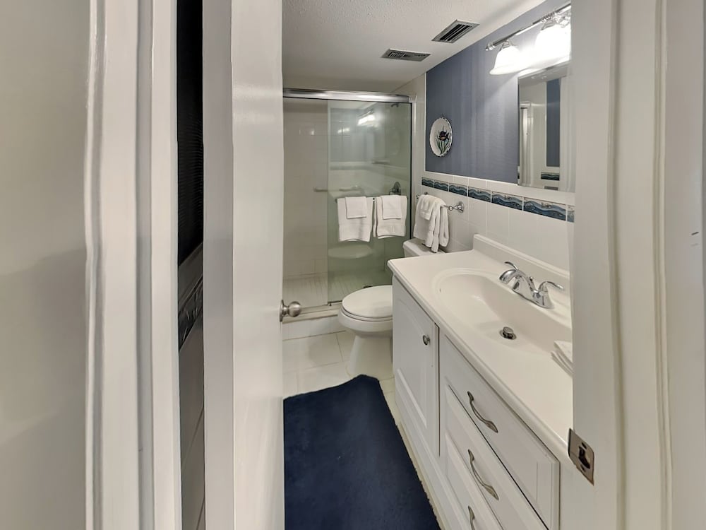 Barry Palm 202 by Distinctive Beach Rentals