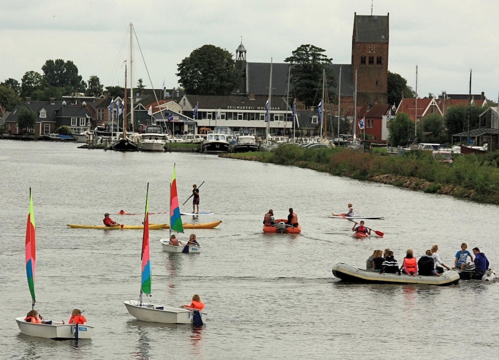 Nice Holiday Home on the Water in Grou