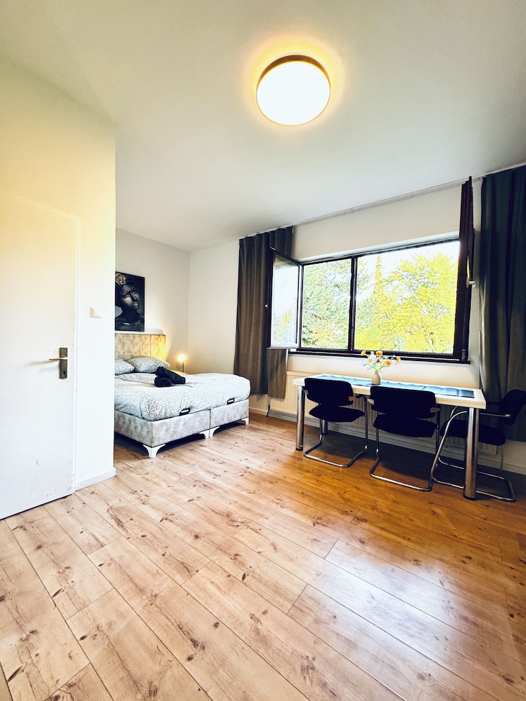 Central 8BR Stay with Garden and Terrace