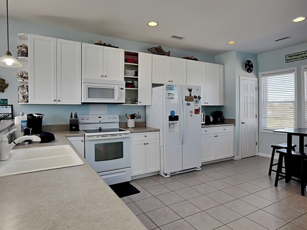 Bel Sole (Beautiful Sun) by Topsail Realty