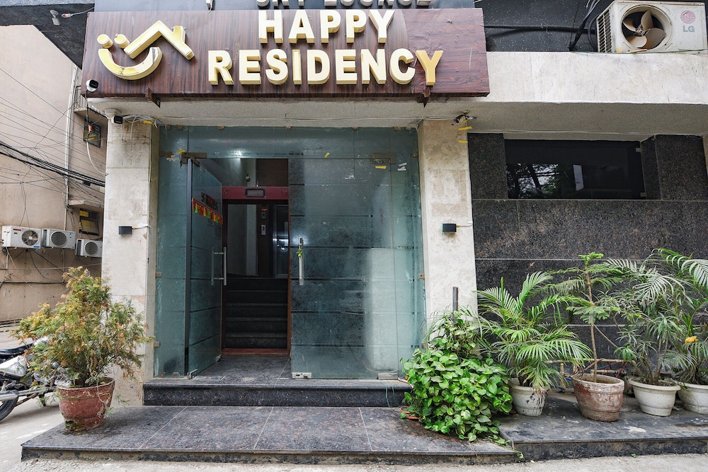 Fabhotel Happy Residency