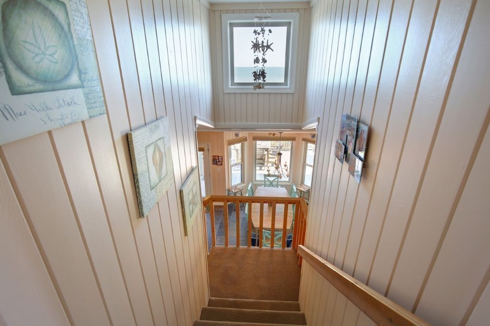 Windchimes 4 Bedroom Home by RedAwning