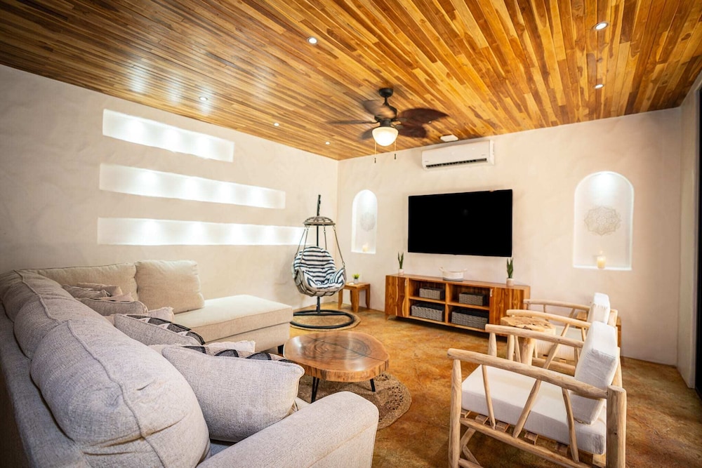Bohemian Tropical Villa with a Tiki-Style Swimming Pool & Swim-Up Bar with an Attached Studio Apartment