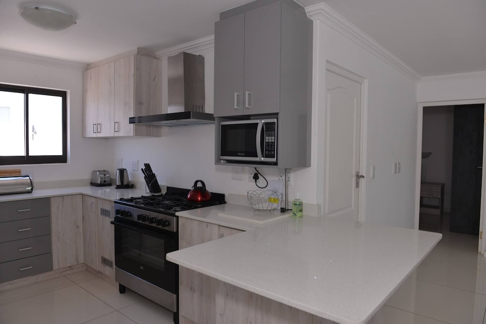 Pelican Cove is a Modern 4-bedroom Holiday Home in Langebaan With Some Sea Views