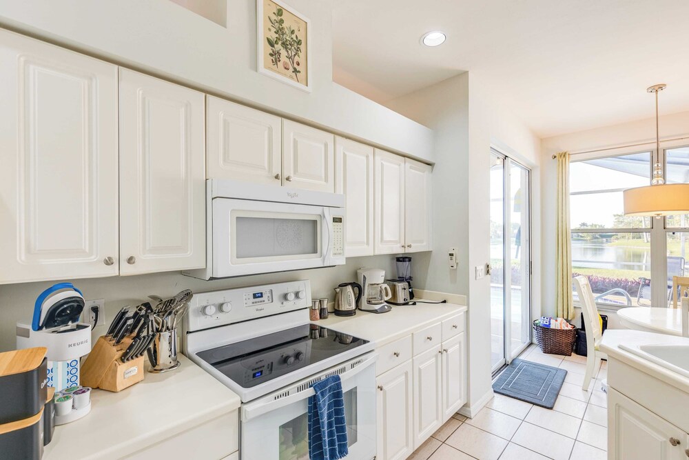 Private Pool, Pond Views, & Bonus Lounge in Gated Naples Community Drive to Dining & Sand