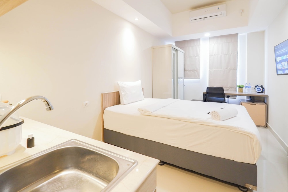 Simply And Homey Studio At Evenciio Margonda Apartment