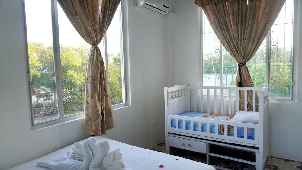 See Belize Waterside Sea View 2-bedroom Apartment w Balcony, Pool & Deck 2nd FL