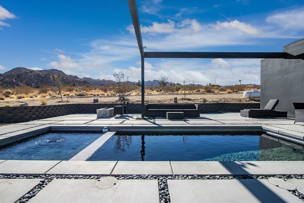 Luxe Modern Escape w Pool Hot Tub Firepit Desert View Lassen by Avantstay