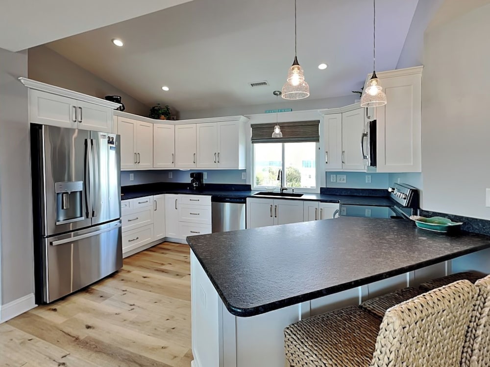 Squirrelly Banana by Topsail Realty