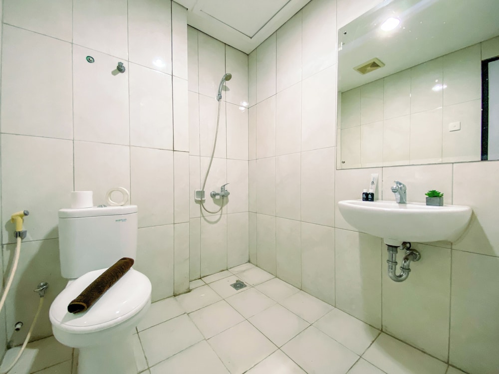 Good Designed and Homey 3BR Nifarro Park Apartment