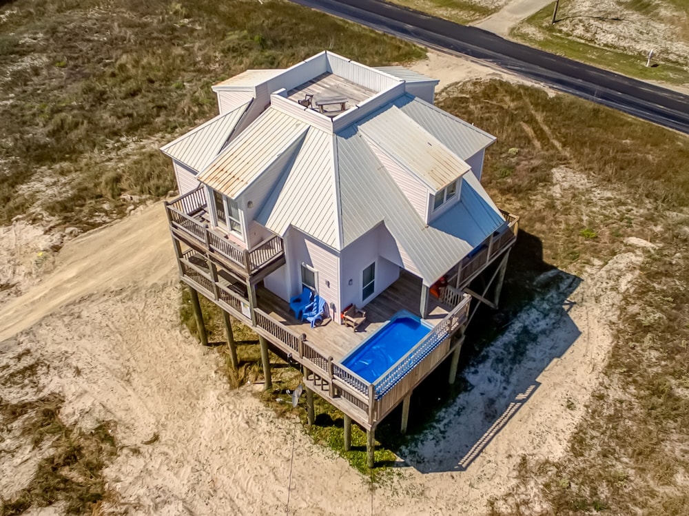 Second Wind - Recently Renovated! Small Private Pool, Game Room, Crows Nest, The Perfect Vacation Spot! 4 Bedroom Home by RedAwning