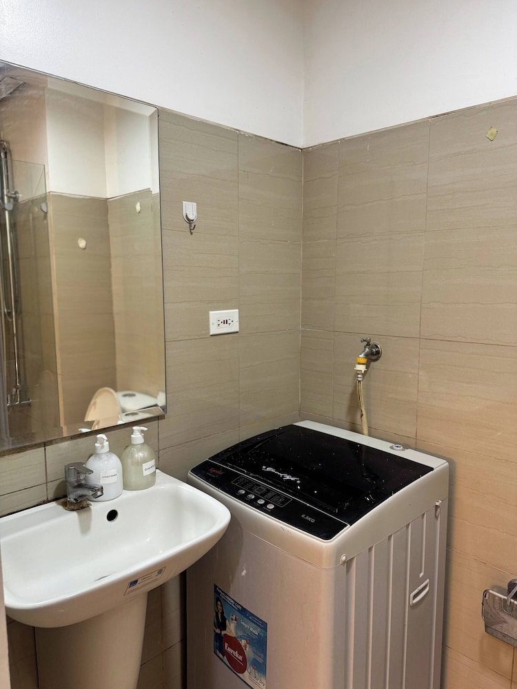 Relax in Pasay City's Best Kept Secret - Spacious Condo With Garden View