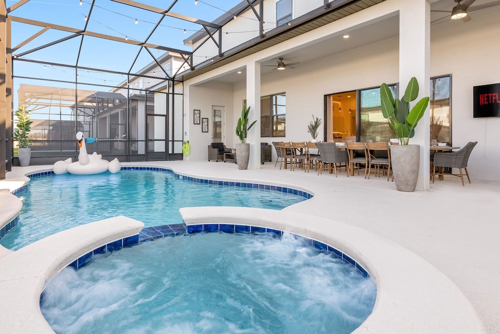 Spacious Oasis for Your Big Crew Games Pool BBQ