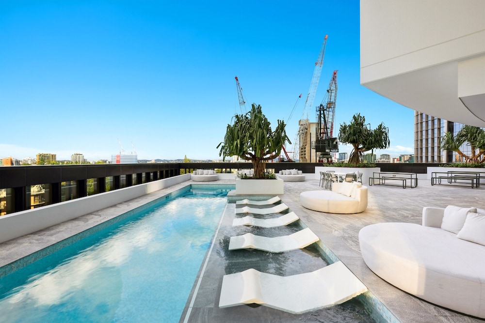 Modern City Escape With Pool Access and Views