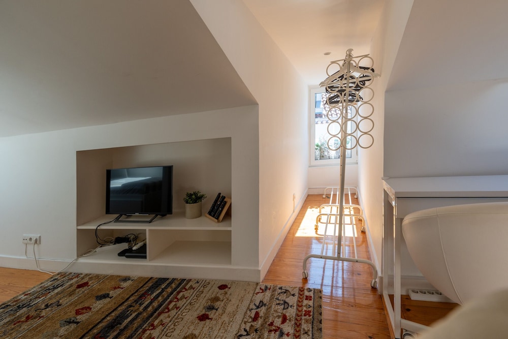 Bairro Alto Tiny Studio by Homing