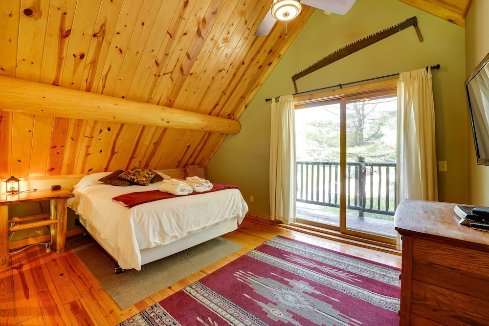Secluded Log Cabin in NW Michigan: Hot Tub Deck - Property Image 28
