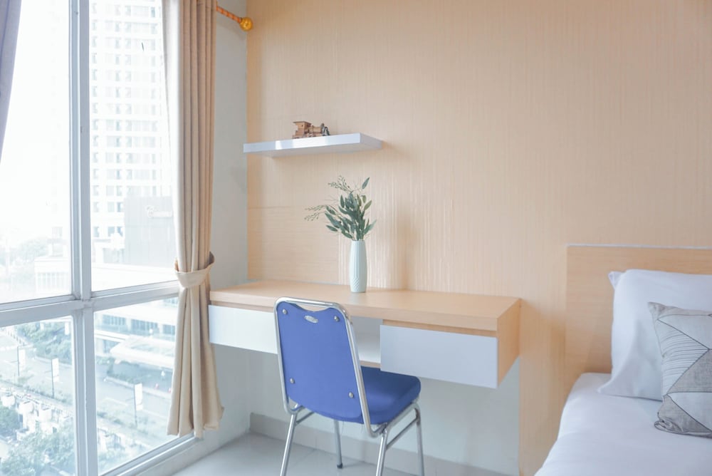Cozy Stay and Strategic Studio Apartment at Grand Dhika City