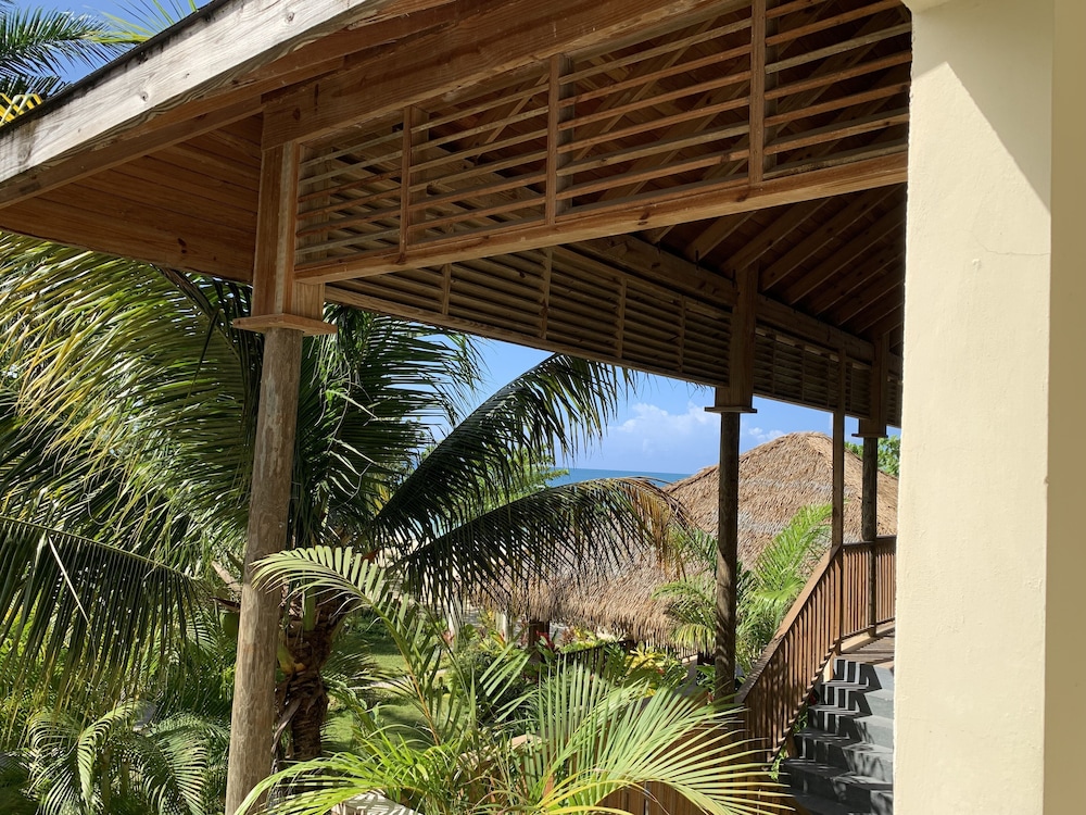 King Suite at Oceanview Resort in Jamaica - Enjoy 7 Miles Of White Sand Beach! 1 Bedroom Villa by RedAwning