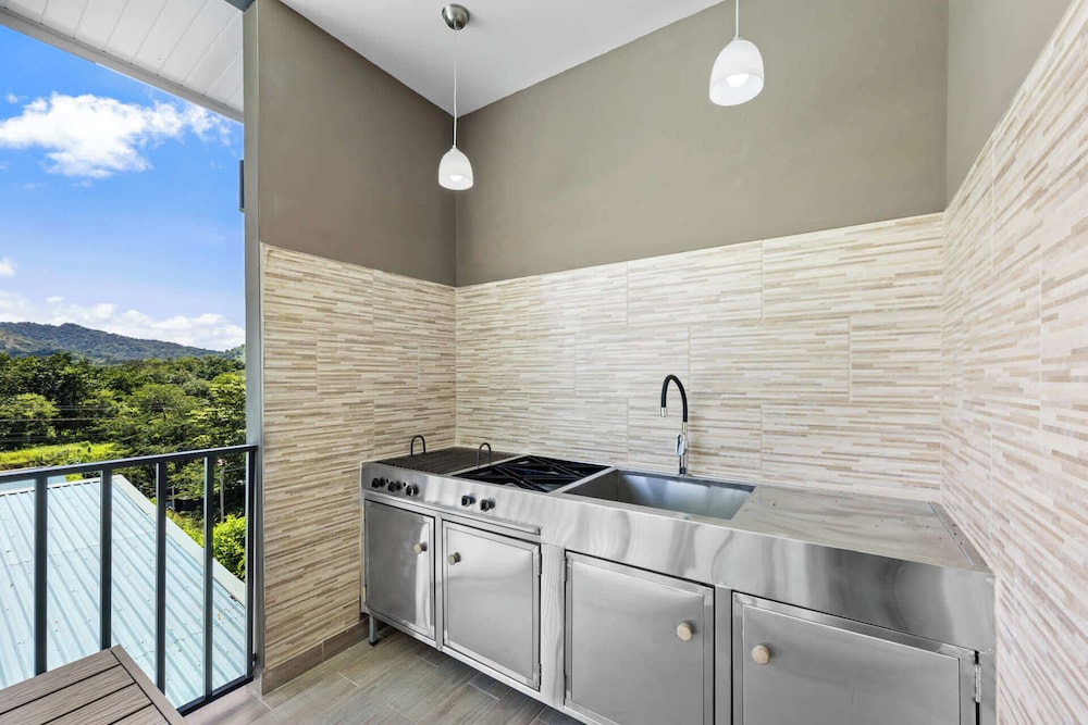 Modern Home with Lush Mountain Views and Spectacular Shaded Terrace in Private Gated Community