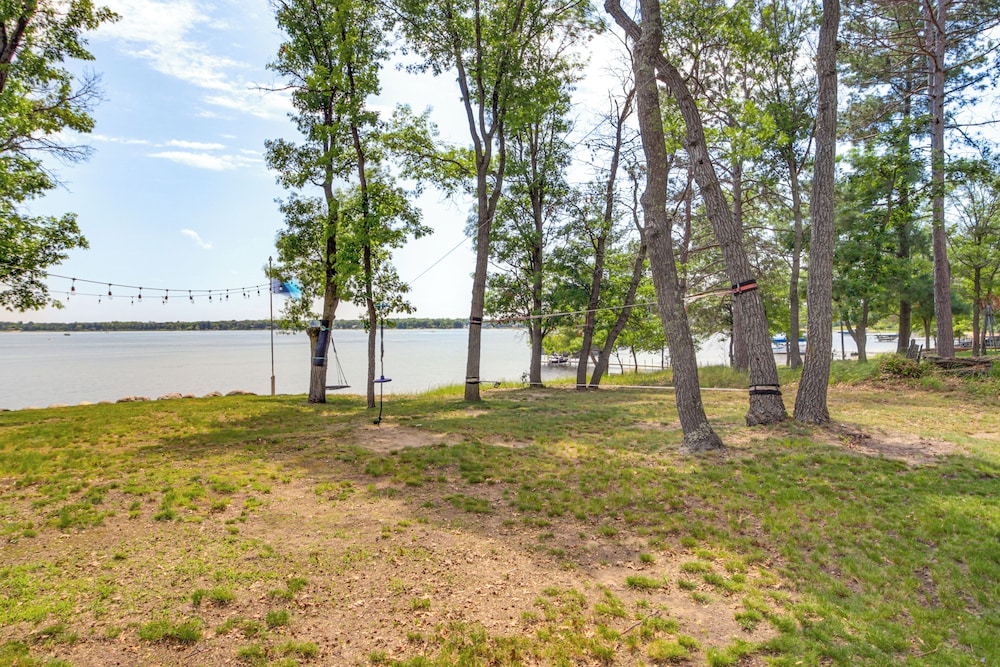 Private Beach & Dock: White Sand Lake Retreat!