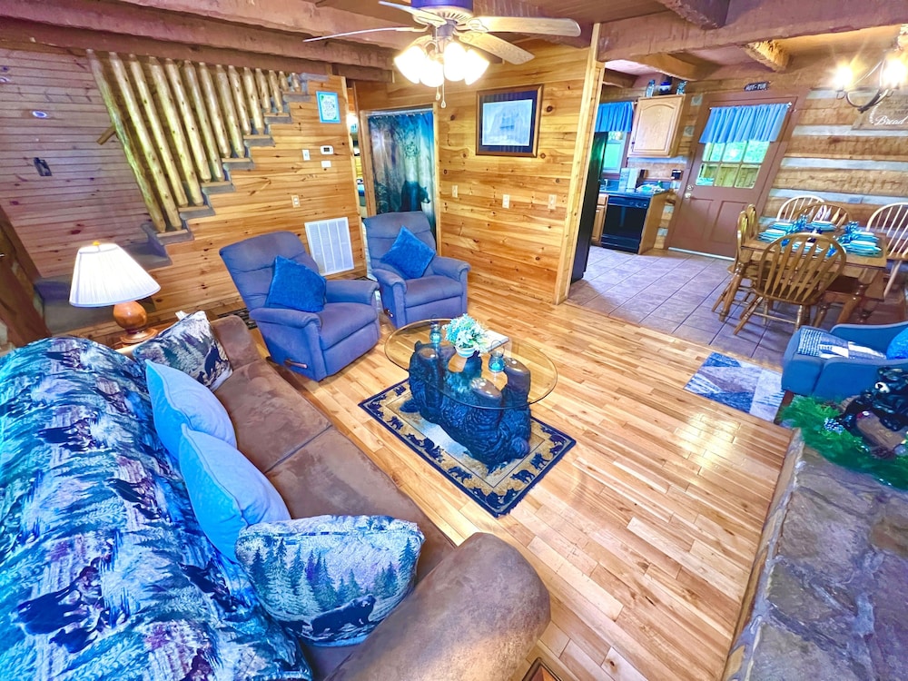 New Song Appalachian Chink Style Cabin features Foosball and Air Hockey Table by RedAwning