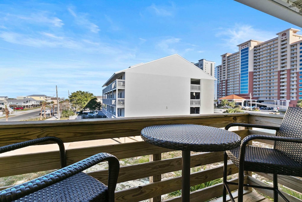 Spacious 2BR Condo With Pool Steps From the Beach