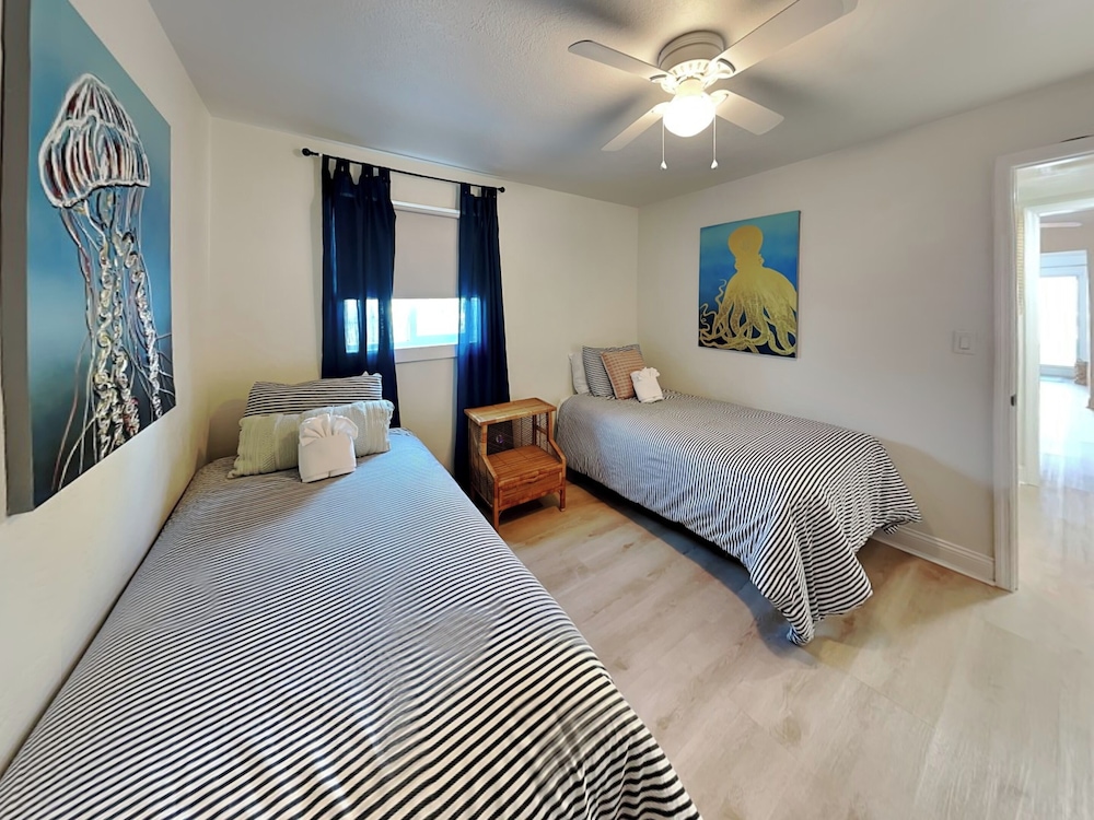 Bathing Suit Beach Bungalow by Distinctive Beach Rentals