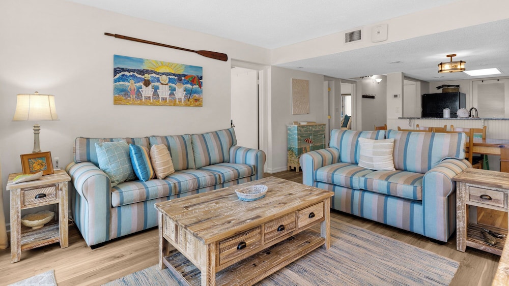 Beachfront Charm Meets Lake Life + Free Tickets: Dolphin Cruise & More!