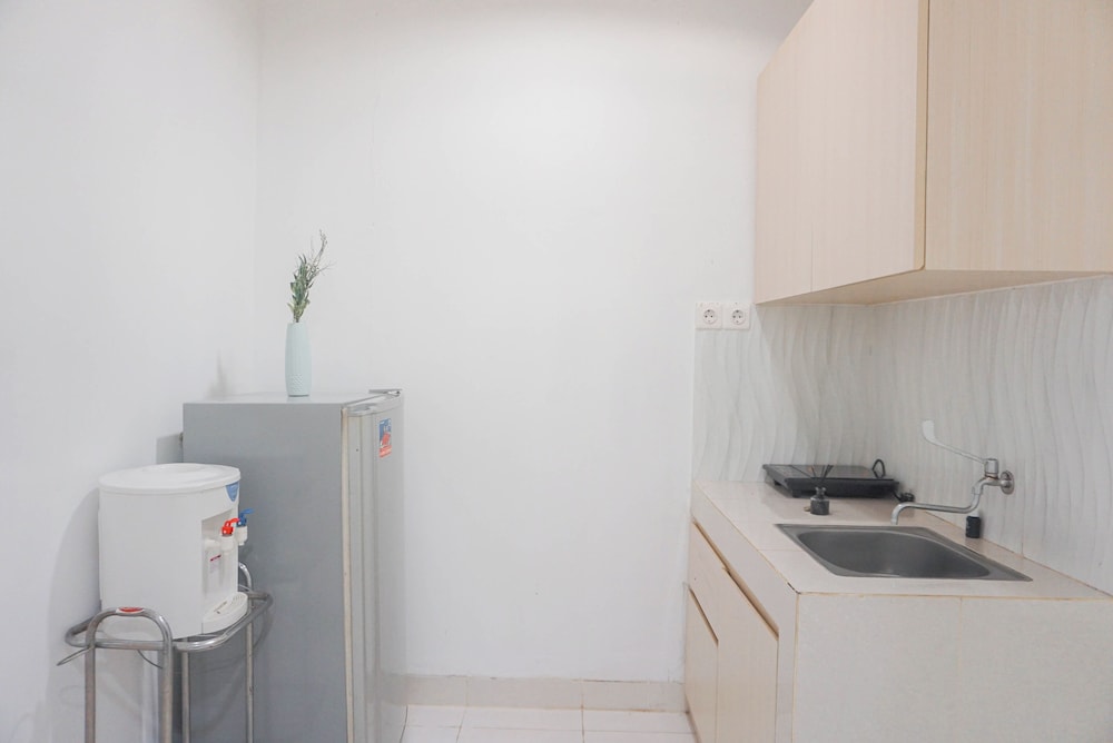 Cozy Living 1BR at Sentul Tower Apartment