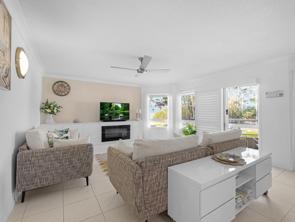 Bright Coastal Stay With Pool and Beach View