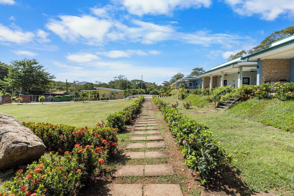 Modern Home with Lush Mountain Views and Spectacular Shaded Terrace in Private Gated Community