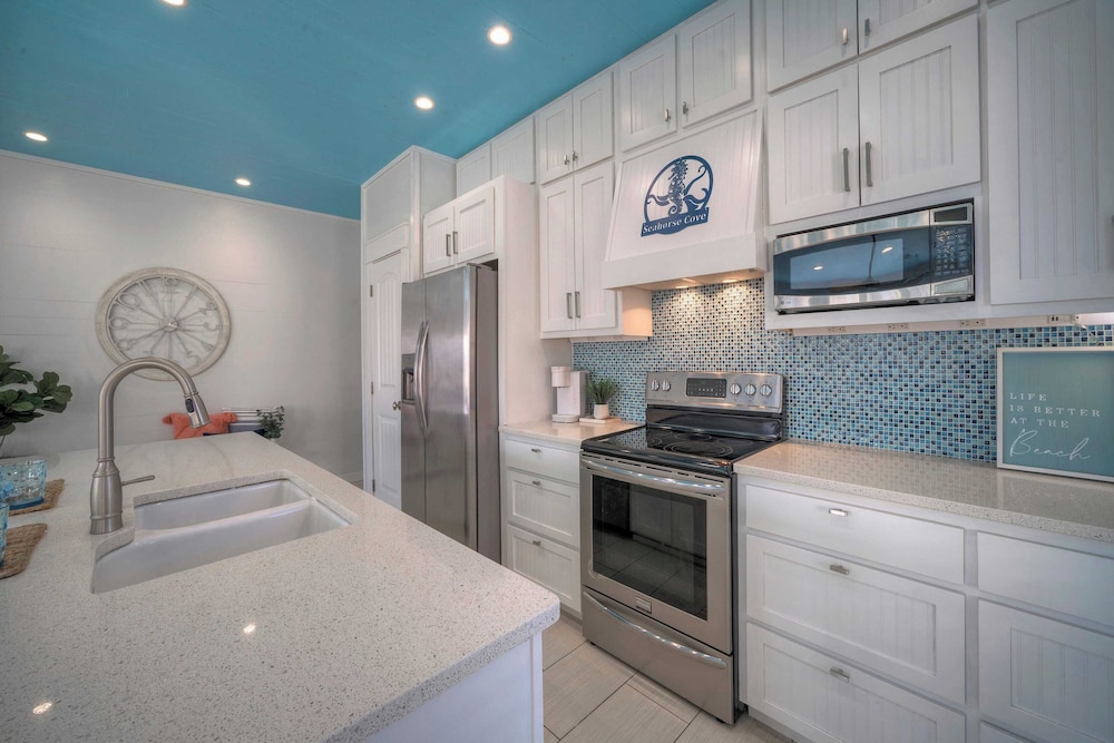 Pool Access, Private Patio Living, Near the Beach Seahorse Cove by Avantstay