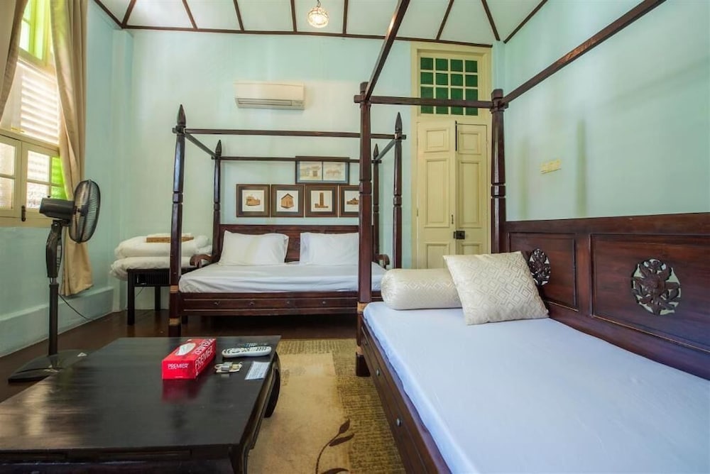 PalanquInn Heritage Suites