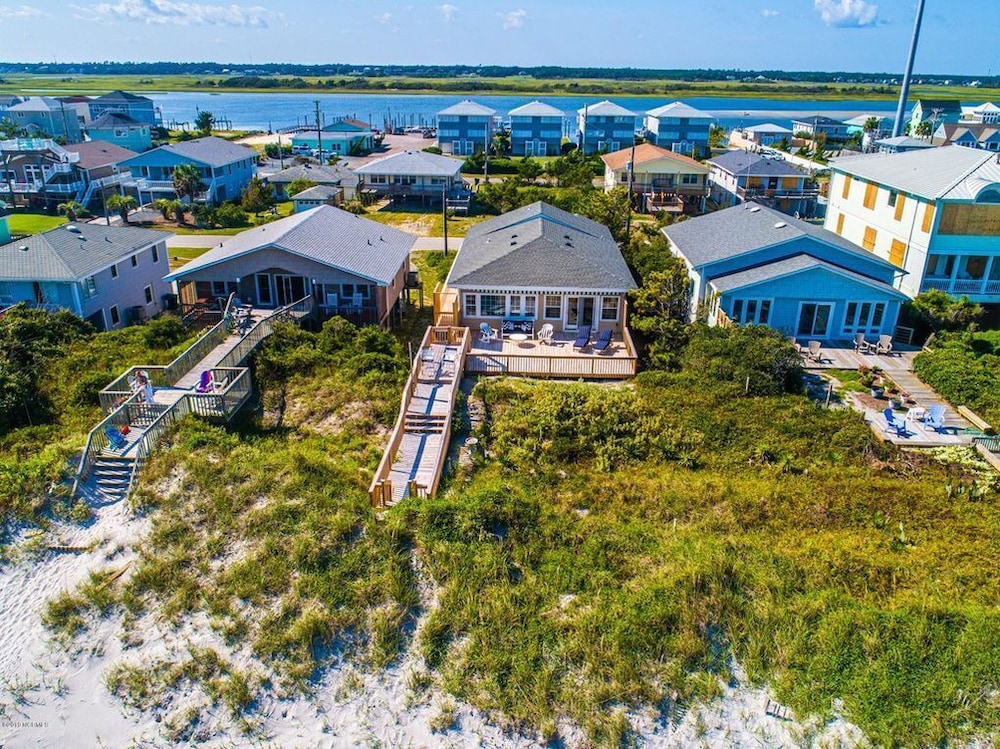 A Charm of Finches by Topsail Realty