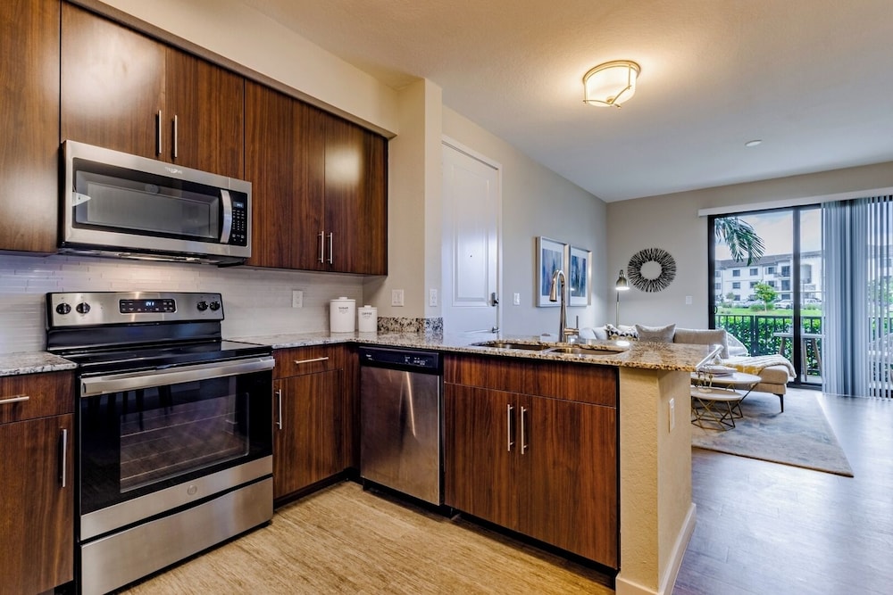 Modern 2BR Fort Myers Condo Pool, BBQ & Near Beaches