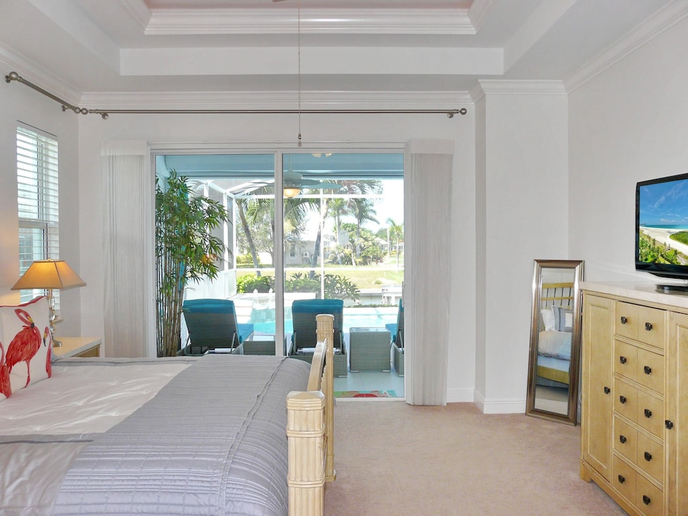 Relaxing Waterfront Home With Pool and Steps to Beach view 3