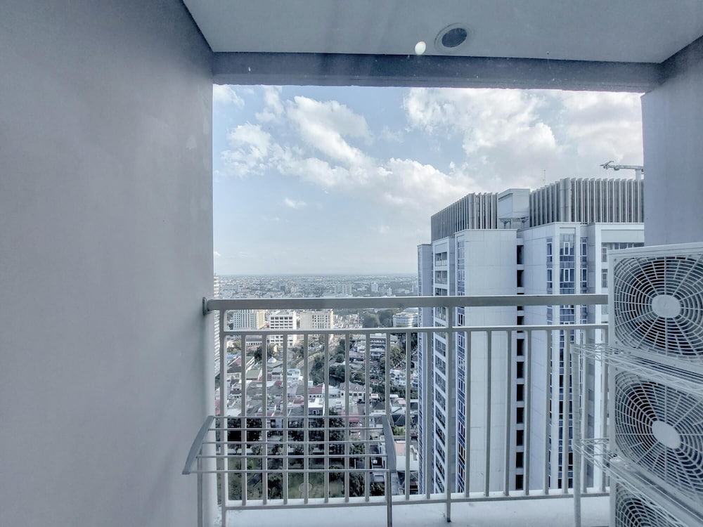 Homey And Compact 2Br Podomoro City Deli Medan Apartment