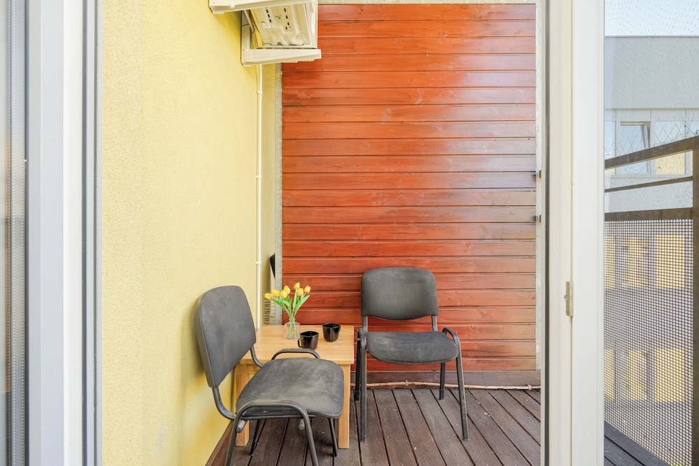 Wroclaw Dark Blue Apartment by Renters