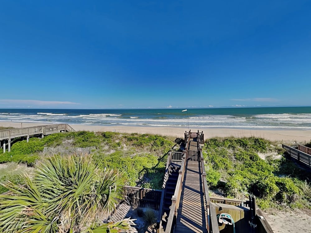 Blue Me A Wave by Topsail Realty