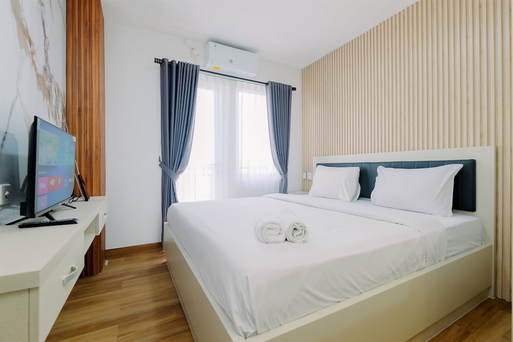 Restful and Modern 2BR at Sentul Tower Apartment